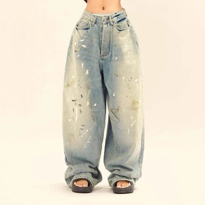 Jeans amples délavés et déchirés décontractés, style unisexe amincissant avec motifs éclaboussures d'encre pour hommes et femmes