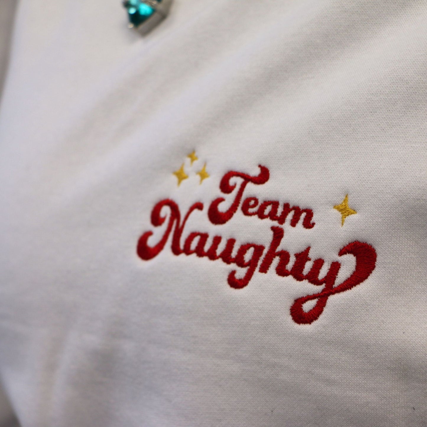 Crewneck "Team Naughty" brodé