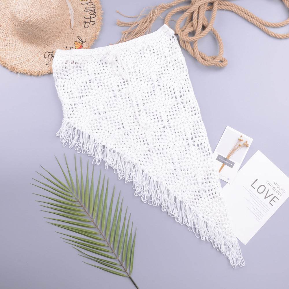 European And American Women's See Through Hollow Knitted tassel fringe Slant Beach Skirt