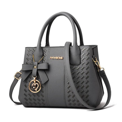 Affordable Luxury formal Handbag PU Leather Made.