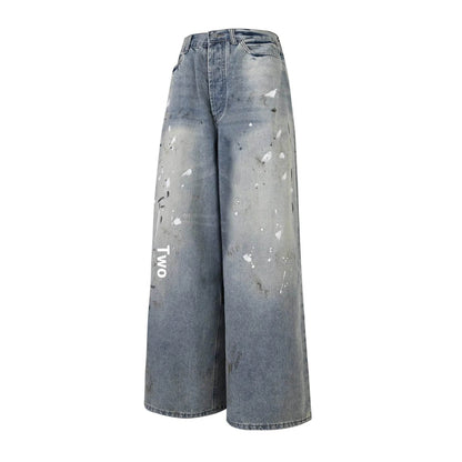 Jeans amples délavés et déchirés décontractés, style unisexe amincissant avec motifs éclaboussures d'encre pour hommes et femmes