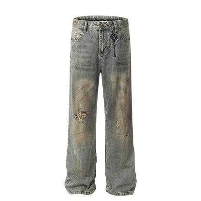 Pantalon en jean pour homme à effet usé, délavage industriel