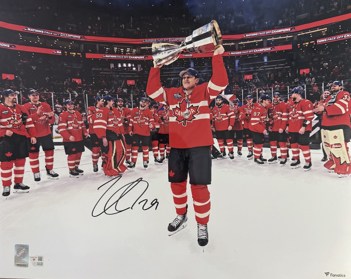NATHAN MACKINNON AUTOGRAPHED TEAM CANADA 2025 4 NATIONS CHAMPIONSHIP CELEBRATION 16X20 PHOTO