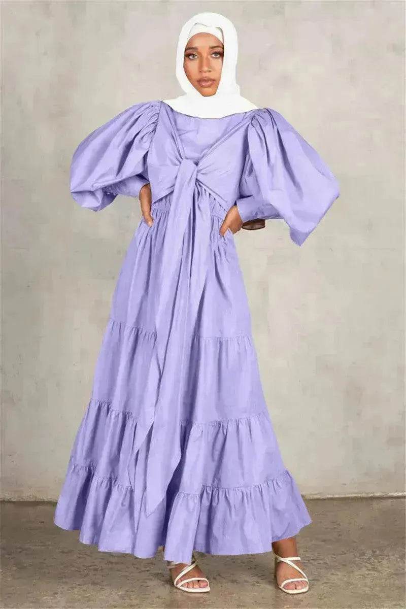 Robe d'été française à manches bouffantes et bandage, style Moyen-Orient, Europe et États-Unis, pouvant être portée de différentes façons.