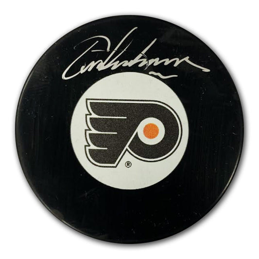 ERIC LINDROS SIGNED PUCK - PHILADELPHIA FLYERS LARGE LOGO