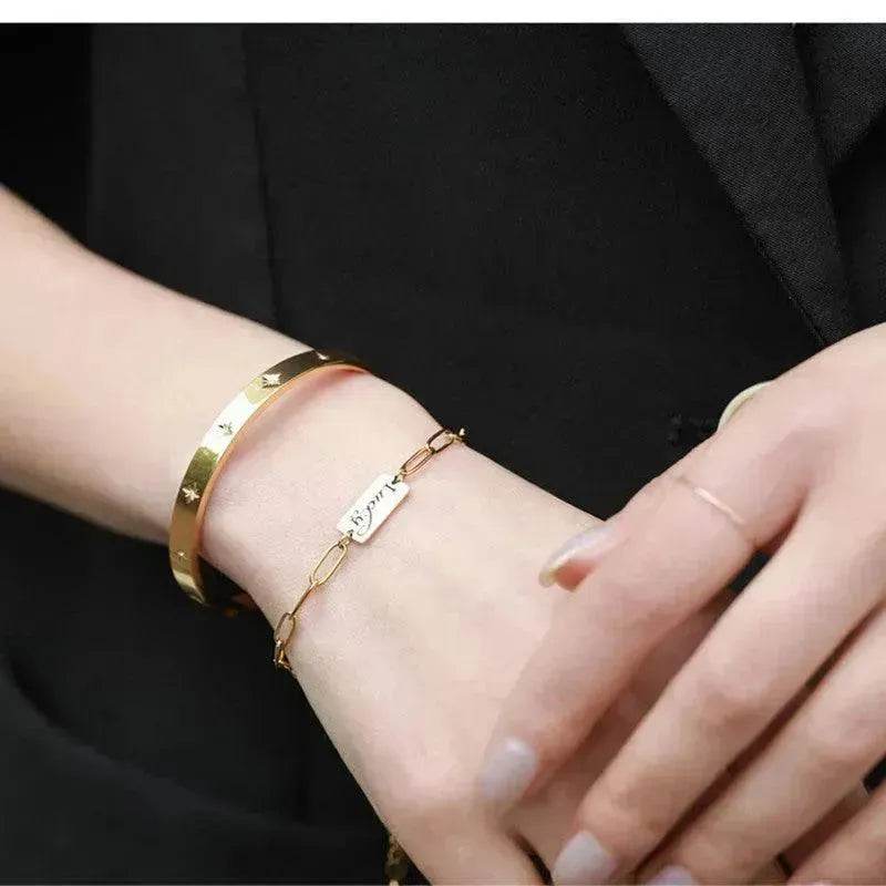 Bracelet étoile en acier titane plaqué or 18 carats pour femme Bracelet doré