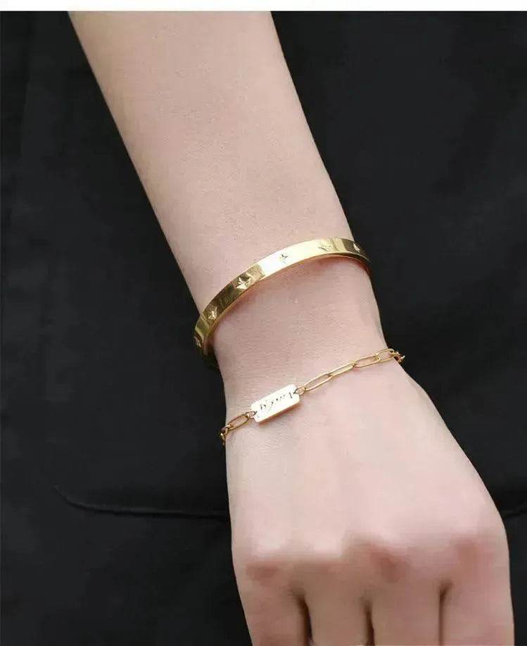 Bracelet étoile en acier titane plaqué or 18 carats pour femme Bracelet doré