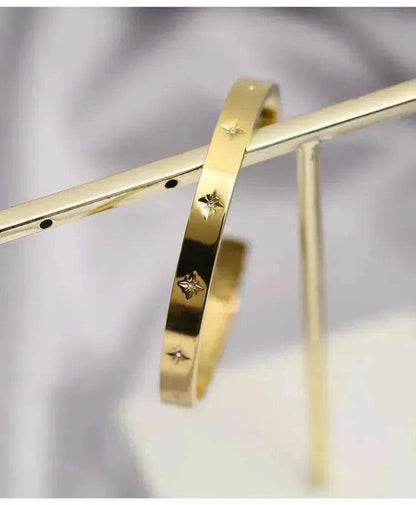 Bracelet étoile en acier titane plaqué or 18 carats pour femme Bracelet doré