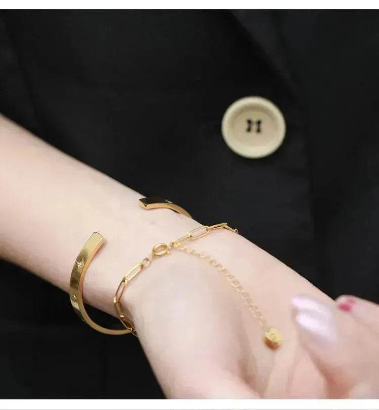 Bracelet étoile en acier titane plaqué or 18 carats pour femme Bracelet doré